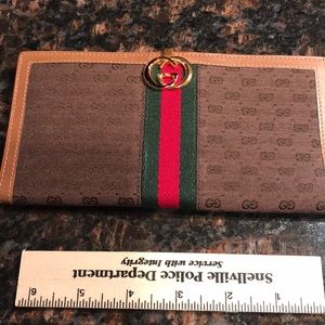 Authentic GUCCI wallet/checkbook cover.